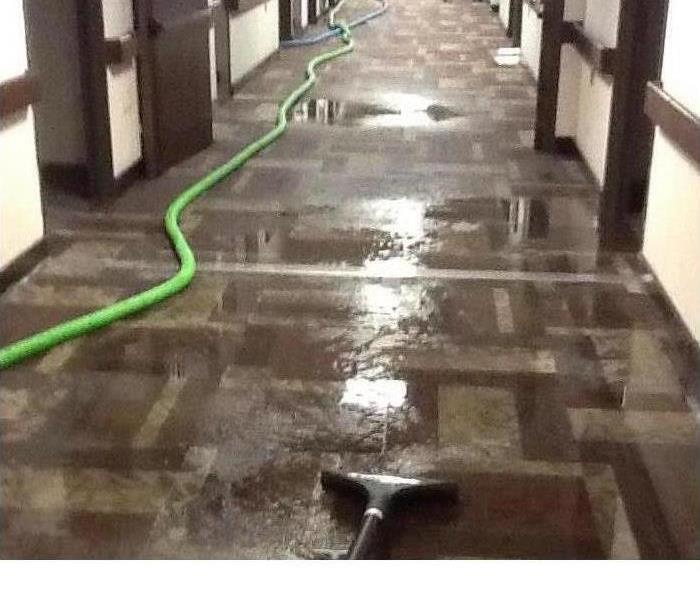 Water soaked carpet in a commercial building