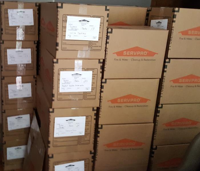 Customer contents packed in labeled SERVPRO boxes.